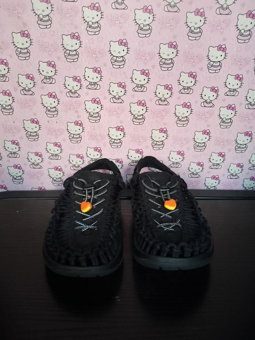 Keen Uneek Black Sandals (Category: Slippers & Slides) located in San Jose del Monte. Submitted by azetor (Listing ID 1468619912, Image 2). Description: - Item: Keen Uneek Sandals - Color: Black with vibrant orange toggle detail - Design: Unique interlocking cord construction with secure open heel strap - Fit & Closure: Adjustable bungee lace system for a customized, comfortable fit - Sole: Durable rubber outsole built for reliable traction - Bes