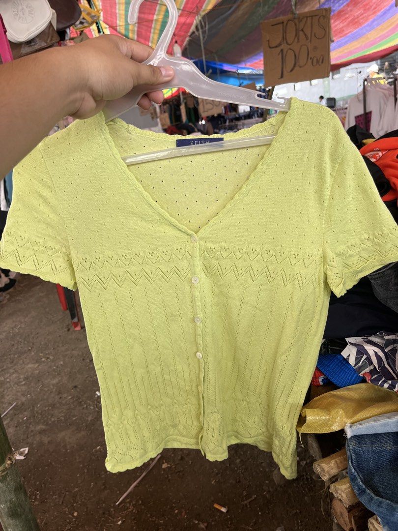 KEITH Lime Green Button-Up Knit Top Cardigan (Category: Longsleeves) located in Pilar. Submitted by fast-flip-ni-miko. (Listing ID 1468550686, Image 2). Description: - Brand: KEITH (Korean tag attached) - Color: Vibrant lime green - Style: Short sleeve V-neck knit top with front 4-button closure - Design: Pointelle pattern body with a chic zig-zag pattern across the chest - Details: Ribbed hem and cuffs for a snug fit - Material: Soft and lightwe