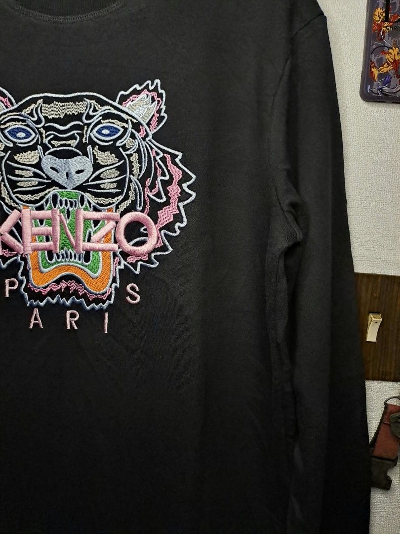 Kenzo Paris Multicolor Embroidered Tiger Logo (Category: Luxury Apparel) located in Manila. Submitted by yaseen_73 (Listing ID 1468710852, Image 2). Description: Authentic Kenzo Paris Tiger Sweatshirt Multicolored Embroidered Tiger Graphic and Paris on the Chest Wearings Size : XXL on Tags Dimensions : Please Refer to the Photo Color Rate : 10/10 Needs Wash Brand New Condition or Best Offer Courier : J&T Lalamove MOP : G C A S H B A N K T R A N S