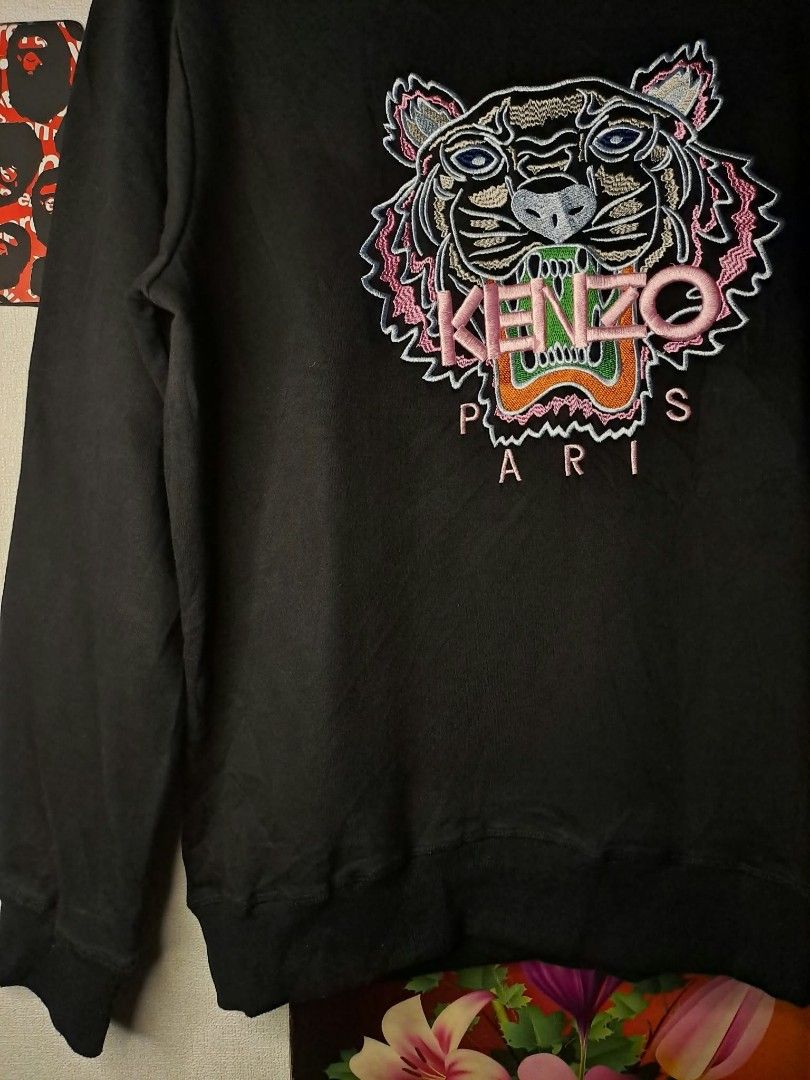 Kenzo Paris Multicolor Embroidered Tiger Logo (Category: Luxury Apparel) located in Manila. Submitted by yaseen_73 (Listing ID 1468710852, Image 3). Description: Authentic Kenzo Paris Tiger Sweatshirt Multicolored Embroidered Tiger Graphic and Paris on the Chest Wearings Size : XXL on Tags Dimensions : Please Refer to the Photo Color Rate : 10/10 Needs Wash Brand New Condition or Best Offer Courier : J&T Lalamove MOP : G C A S H B A N K T R A N S