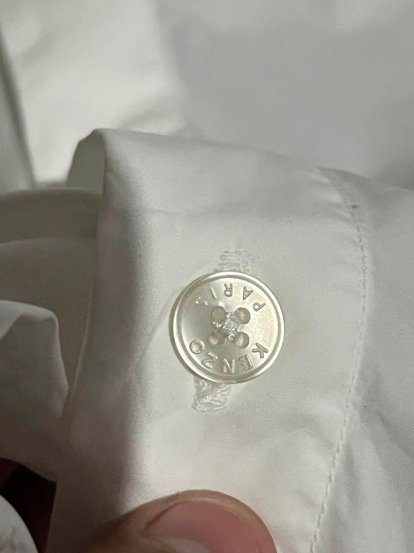 KENZO Tiger Crest Button-Down Shirt White (Category: Tshirts & Polo Shirts ) located in Sindangan. Submitted by waterbop (Listing ID 1468562095, Image 3). Description: EXCELLENT CONDITION SLIM FIT ON TAG ( FIT TO LARGE ) 10/10 COLOR RATE NO ISSUE LOC ZAMBOANGA DEL NORTE.