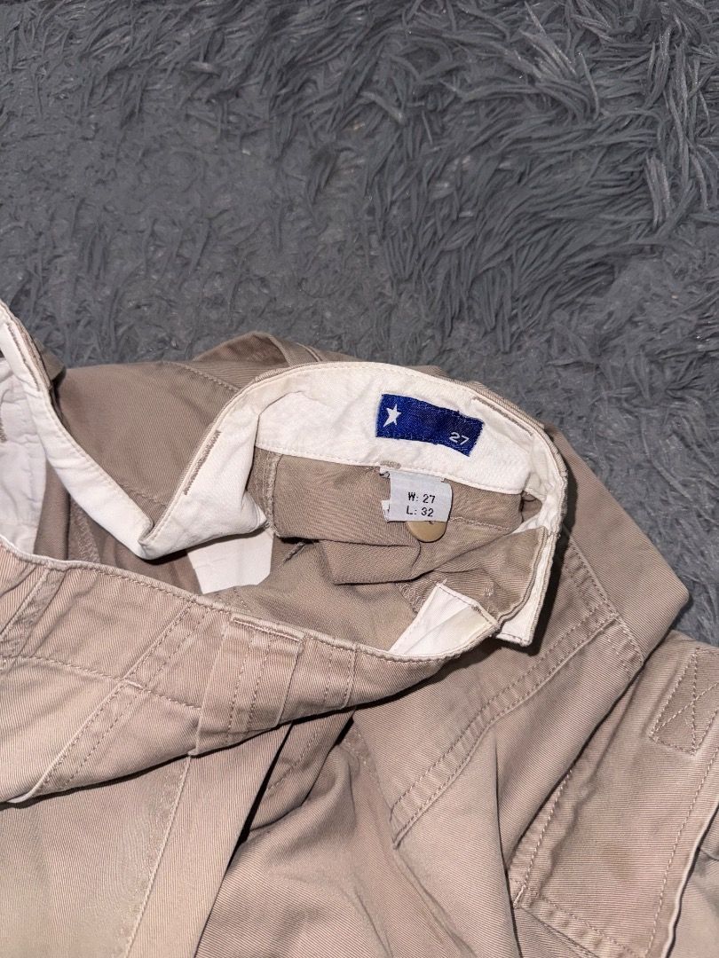 Khaki Utility Cargo Pants with Pockets (Category: Jeans) located in Quezon City. Submitted by ashhaul (Listing ID 1468571045, Image 3). Description: - Style: Relaxed wide-leg fit, streetwear essential - Pockets: Large side utility pockets and deep front pockets - Closure: Button fly - Material: Durable cotton twill that holds its structure - Color: Neutral earthy khaki that matches everything.
