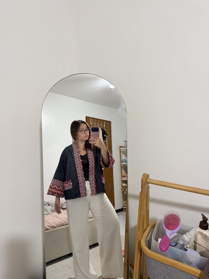 Kimono Cardigan (Category: Coats, Jackets and Outerwear) located in Paranaque City. Submitted by crysizzl (Listing ID 1468541371, Image 2). Description: - Color: Dark blue with multicolor ethnic/geometric prints - Design: Open-front kimono cardigan with front pockets - Details: Printed accents on the collar, cuffs, and pocket trims - Style: Casual, trendy, easy to layer - Condition: Well-maintained and ready to wear.
