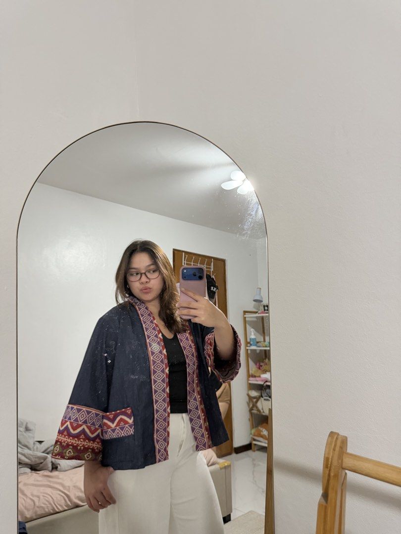 Kimono Cardigan (Category: Coats, Jackets and Outerwear) located in Paranaque City. Submitted by crysizzl (Listing ID 1468541371, Image 1). Description: - Color: Dark blue with multicolor ethnic/geometric prints - Design: Open-front kimono cardigan with front pockets - Details: Printed accents on the collar, cuffs, and pocket trims - Style: Casual, trendy, easy to layer - Condition: Well-maintained and ready to wear.