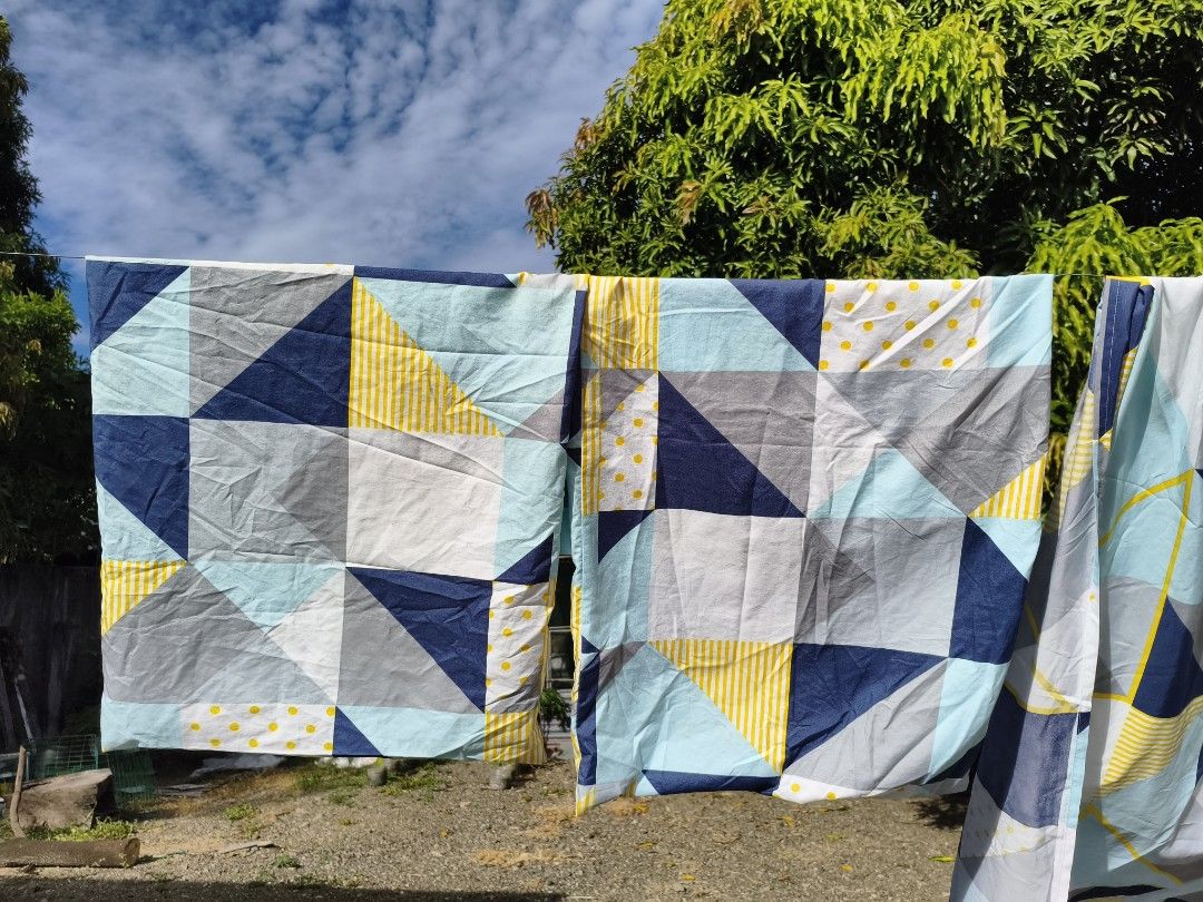 King Size Geometric patchwork pattern bedsheet set with pillowcases (Category: Bedding & Towels) located in Munoz. Submitted by toy_zone (Listing ID 1468501289, Image 2). Description: - Geometric patchwork design with striped and polka dot accents - Color palette: shades of blue, grey, white, and yellow - Include matching pillowcases - Freshly laundered and sun-dried outdoors - Clean and 100% ready to use on your bed like new no issue location mu