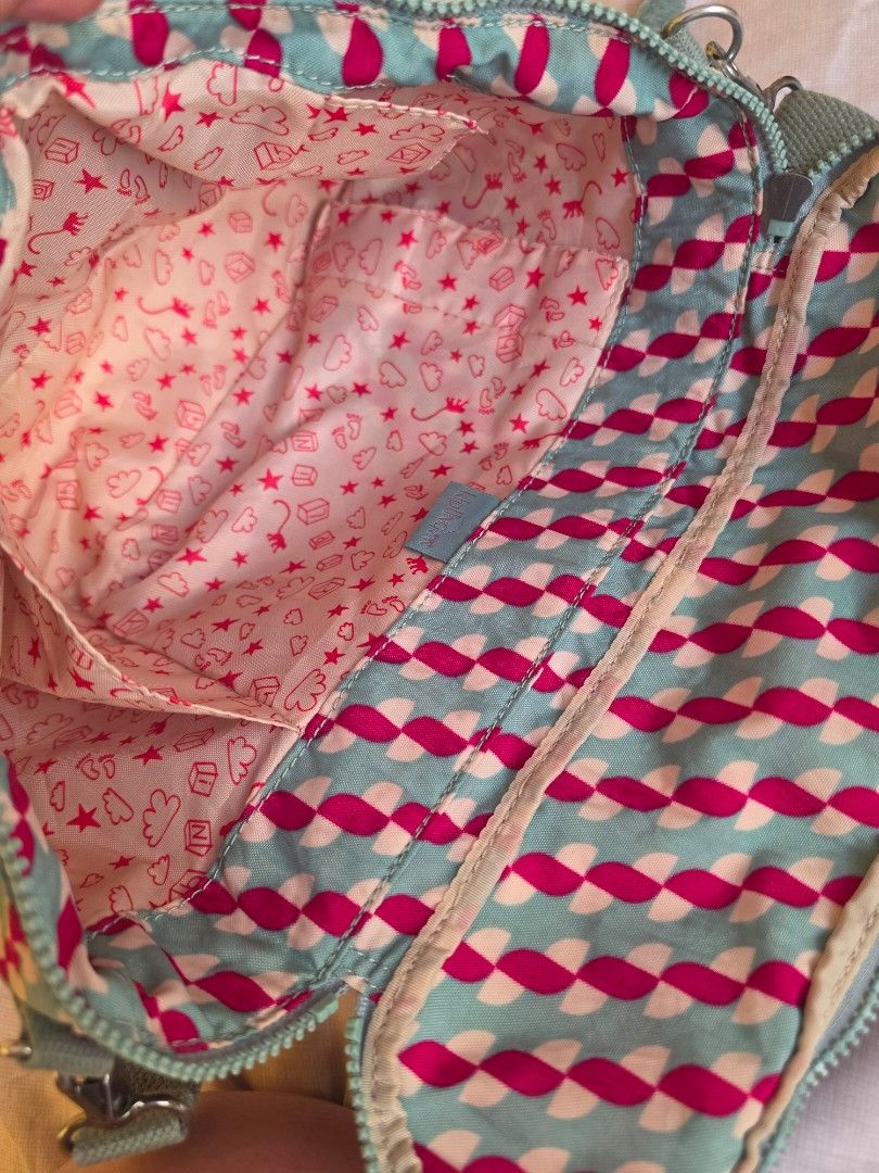KIPLING (Category: Cross-body Bags) located in Talisay. Submitted by tinkerbellaaaa (Listing ID 1468569914, Image 3). Description: preloved Kipling crossbody bag in med-large with tumbler compartment inside. please manage your expectations.