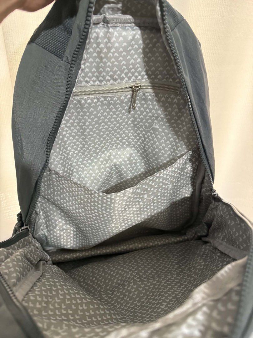 Kipling Grey Backpack with Monkey Keychain (Category: Backpacks) located in Marikina City. Submitted by bry_lei26 (Listing ID 1468550371, Image 3). Description: - Authentic Kipling backpack in versatile dark grey - Crafted from durable, lightweight nylon material - Roomy main compartment with secure zippered closure - Multiple exterior and interior zippered and slip pockets for easy organization - Adjustable shoulder straps for all-day comfort - 