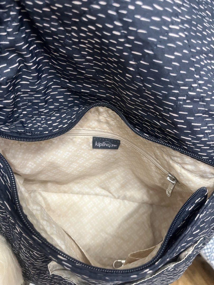 Kipling Gabbie Quilted Crossbody Shoulder Bag (Category: Cross-body Bags) located in Bulacan. Submitted by spring_cleaning_ (Listing ID 1468604093, Image 3). Description: - Brand: Kipling - Color: Black and white quilted - Style Code: K11273-79Q - Includes signature furry monkey keychain - Adjustable shoulder strap for a custom fit - Exterior zippered pocket for easy access - Patterned fabric interior lining with zip and slip compartments - Perfe