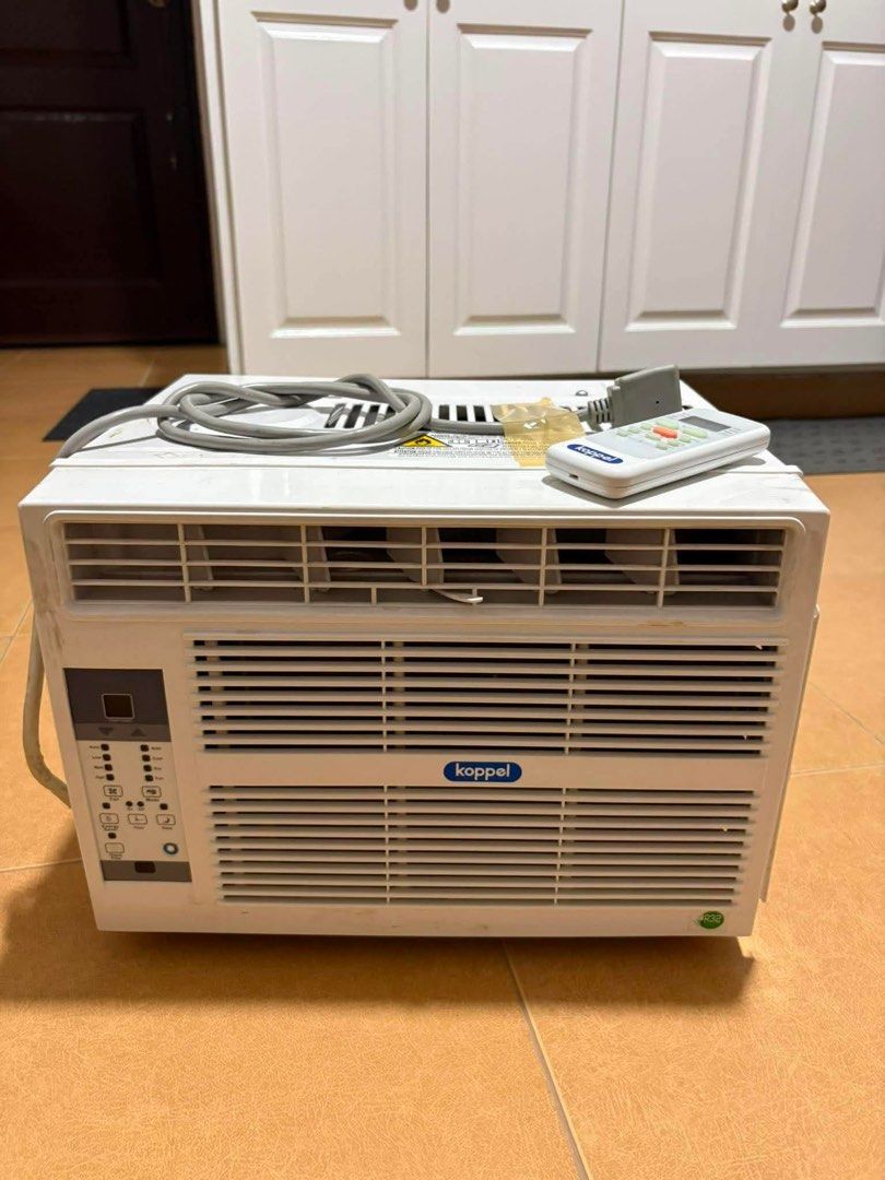 Koppel KWR-06R4A2 Window Type Air Conditioner (Category: Air Conditioning and Heating) located in Manila. Submitted by jemarie173810 (Listing ID 1468507535, Image 3). Description: - Brand/Model: Koppel Window Type AC (KWR-06R4A2) - Cooling Capacity: 6,135 Btu/h - Power: 230V, 60Hz, 1-phase (575W) - Inclusions: Remote control and power cord - Color: White with standard front vents and control panel - Serial Number: 231019-00786.