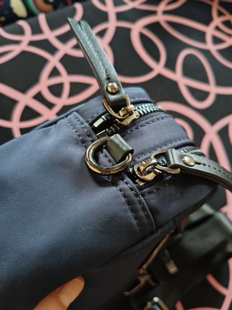 Korean brand sling bag (Category: Cross-body Bags) located in Kalibo. Submitted by abhie_one30 (Listing ID 1468664085, Image 3). Description: looks new . nylon material . small size only ..