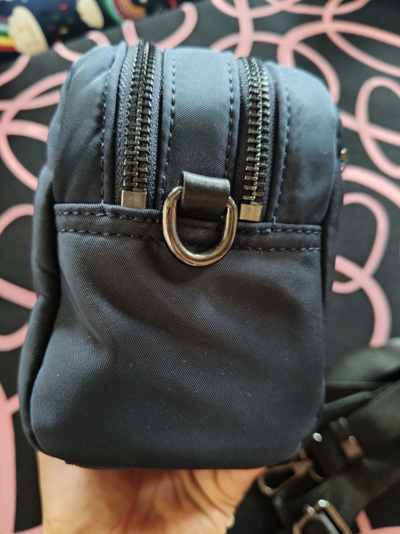 Korean brand sling bag (Category: Cross-body Bags) located in Kalibo. Submitted by abhie_one30 (Listing ID 1468664085, Image 2). Description: looks new . nylon material . small size only ..