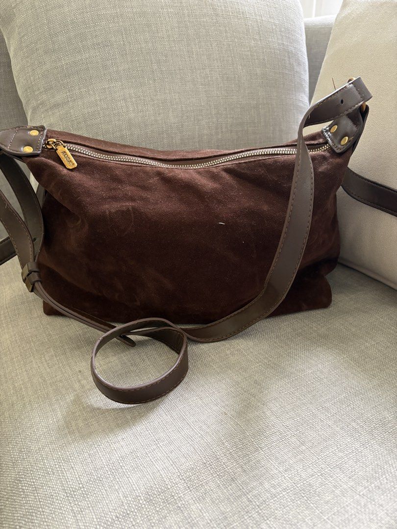 KOSK Brown Suede Shoulder Bag (Category: Shoulder Bags) located in Paranaque City. Submitted by craftywoobieph (Listing ID 1468541792, Image 1). Description: - Brand: KOSK Brand Leather - Material: Premium brown suede - Closure: Zip top with KOSK zipper pull - Hardware: Gold tone with adjustable leather strap - Interior: Clean beige lining with inner zip pocket and KOSK woven brand tag - Condition: Excellent, clean inside and out.