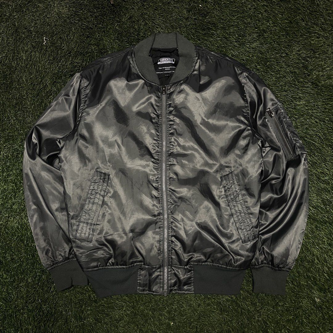 Kurocker’s Utility MA-1 Flight Bomber Jacket (Category: Coats, Jackets and Outerwear) located in Pasig City. Submitted by icie_finds (Listing ID 1468622808, Image 1). Description: Kurocker’s Utility MA-1 Flight Bomber Jacket SIZE: Tagged M (Fits Medium) DIMES: Width: 22.5 inches Length: 25.5 inches Style: Classic MA-1 utility flight bomber jacket featuring a satin shell, full front zip closure, ribbed trim, and sleeve utility zip pocket. Color: C