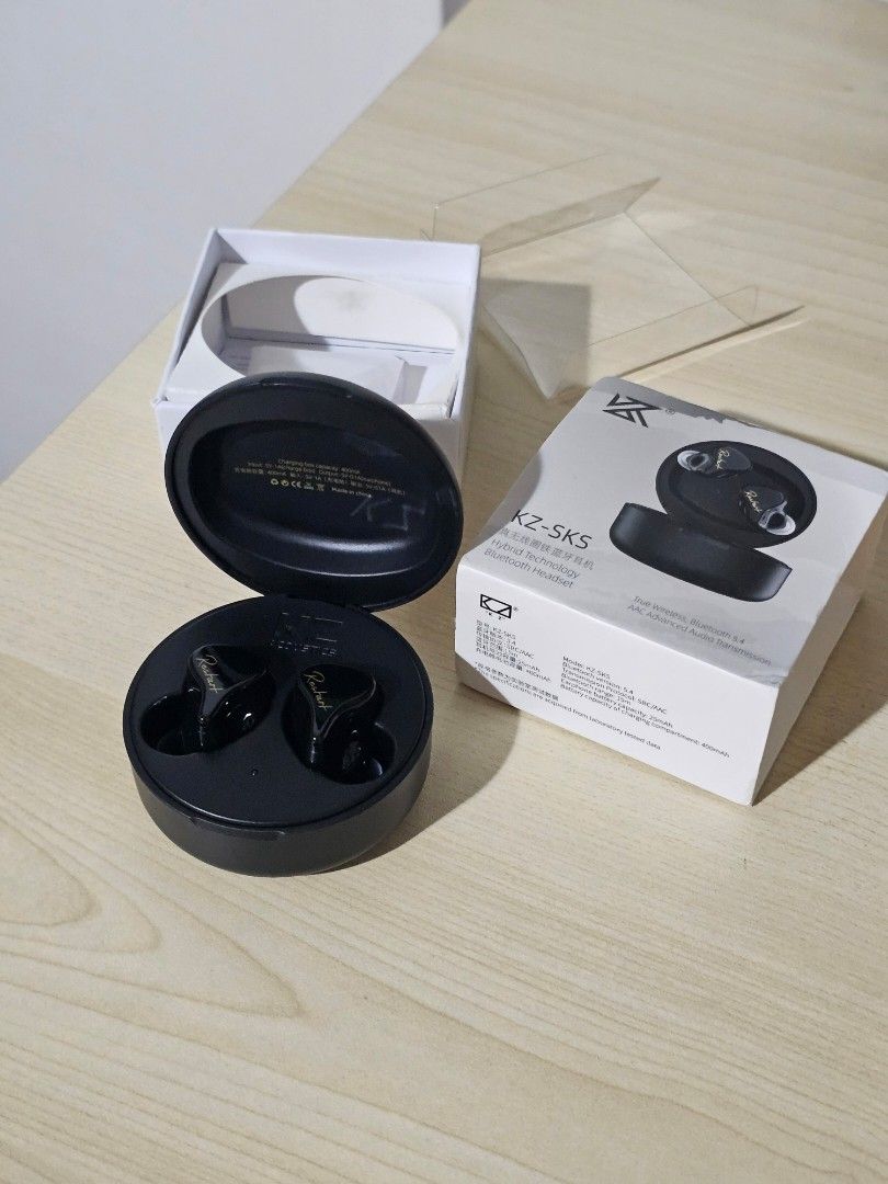 KZ-SKS TWS Wireless Earphones (Category: Earphones) located in Paranaque City. Submitted by mab.villareal (Listing ID 1468528543, Image 3). Description: KZ-SKS wireless earphones in black with charging case and original packaging box. Hybrid technology Bluetooth headset with AAC advanced audio transmission. Brand new. Unused. RFS: overhoarded .