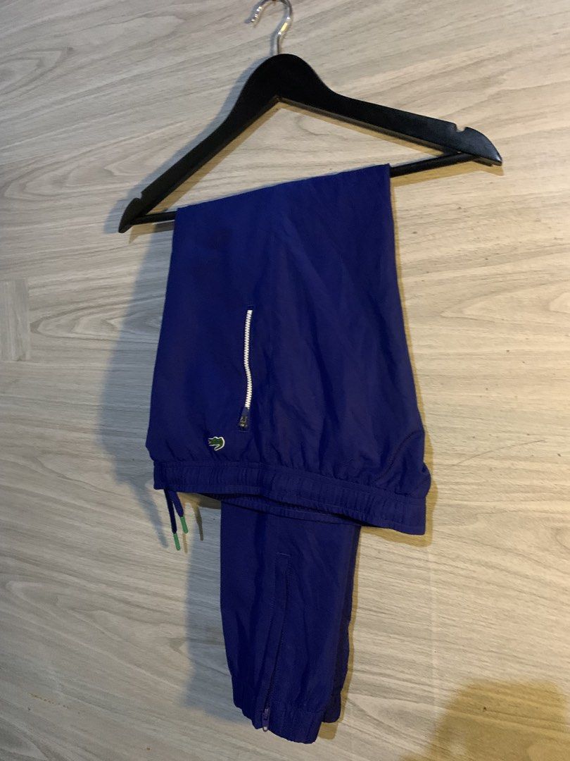 Lacoste Tracksuit (Category: Other Bottoms) located in Butuan. Submitted by thrif_findspeace (Listing ID 1468560859, Image 2). Description: Condition - Excellent Colorate - 9.5 Width - 30 Length - 35.5 Leg Opening - 6.5 Issue : None.