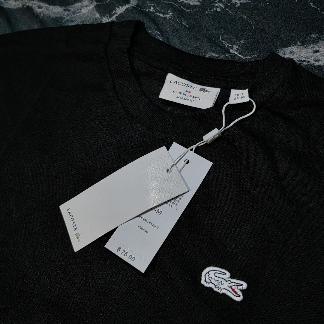 Lacoste Tshirt (Category: Activewear) located in Taguig. Submitted by mr.gbh (Listing ID 1468588375, Image 3). Description: Lacoste Basic Logo Tee Black Size: Medium To Large L-29/W-22 Excellent Condition Php, 699.
