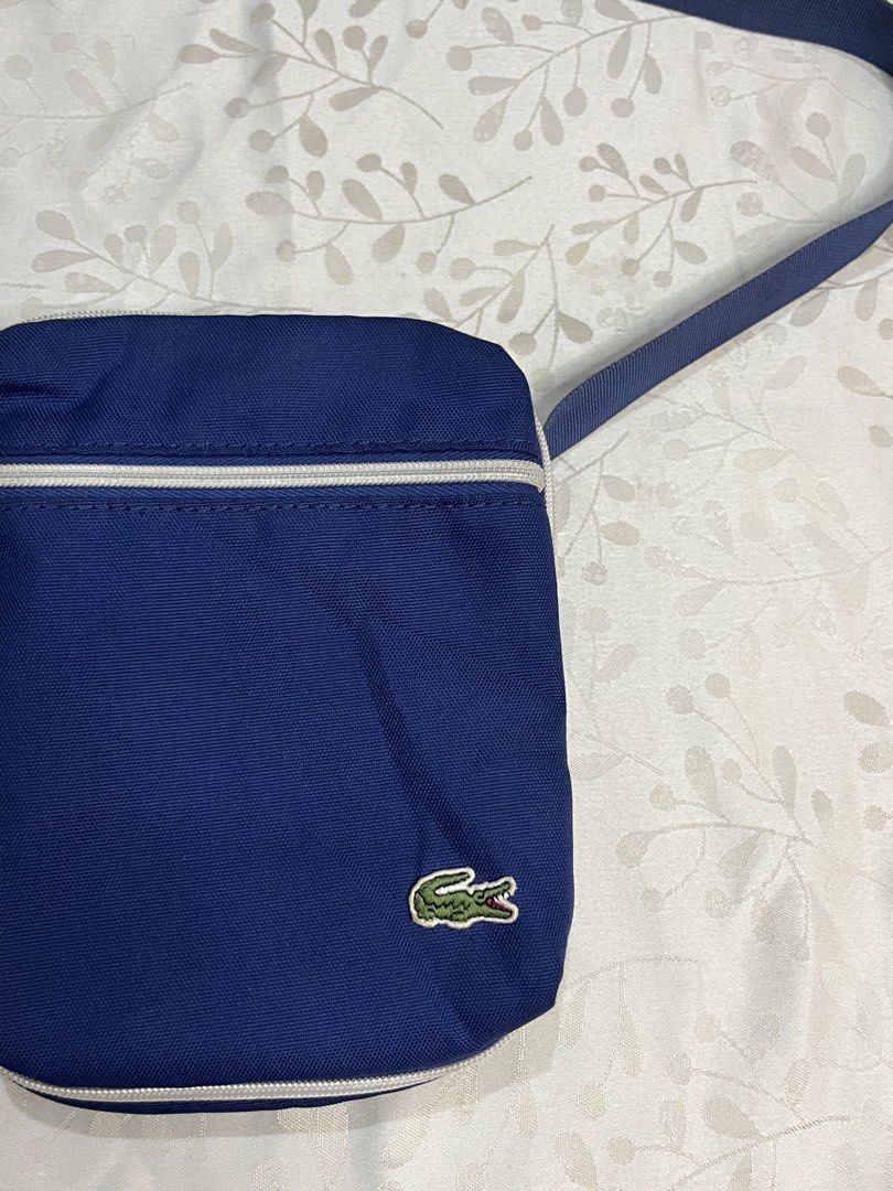Lacoste Vertical Crossbody Bag (Category: Luxury Bags & Wallets) located in Cebu City. Submitted by ayban05 (Listing ID 1468555152, Image 3). Description: .
