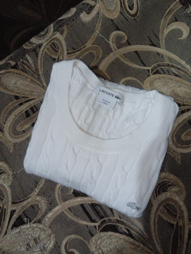 Lacoste White Cable Knit Sweater (Category: Longsleeves) located in Manila. Submitted by adriane.s_lootz (Listing ID 1468651187, Image 3). Description: DIMES : WIDTH 17. LENGTH 23 - Brand: Lacoste - Style: Cable knit sweater - Color: Classic White - Size: 36 (fits S to M) - Material: 100% Cotton EXCELLENT CONDITION NO FLAWS .