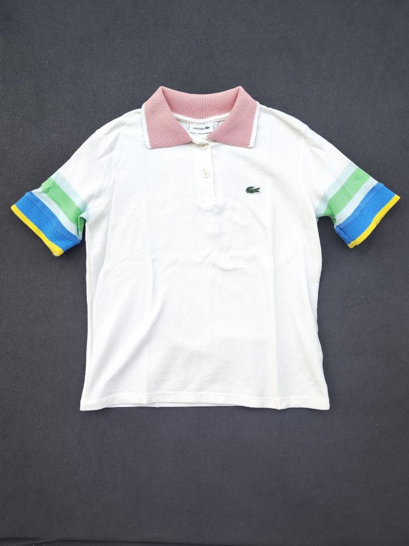 Lacoste Womens Polo Shirt (Category: Shirts) located in Bulacan. Submitted by emilj23 (Listing ID 1468521239, Image 1). Description: Lacoste Womens Polo Shirt Size M L 24 W 19 Condition 9/10 Color rate 9/10 Issue Stains.