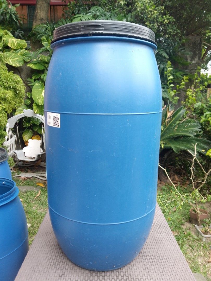 Large Blue Plastic Drum Container with Black Lid (Category: Storage Boxes & Baskets) located in General Trias. Submitted by titojay (Listing ID 1468541239, Image 1). Description: - 170 Liter Drum - Large blue plastic storage barrel with a secure black lid - Versatile use: ideal for holding water, composting, or bulk storage - Sturdy and durable construction, built to withstand outdoor conditions - Condition: minor scuffs on the body from normal h