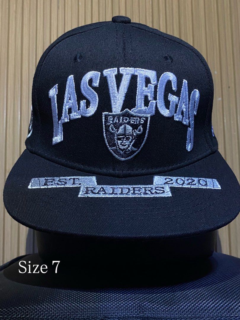 Las Vegas Raiders Closecap Hat Size 7 (Category: Caps & Hats) located in Manila. Submitted by _kyndzgrt (Listing ID 1468682207, Image 1). Description: - Authentic Black Las Vegas Raiders snapback cap - Size 7 tag included - Features embroidered Las Vegas lettering and iconic Raiders shield logo on the front - Brim detailed with 'Est. 2020 Raiders' embroidery - Side panel includes an official Raiders shield patch - Structured fit with a flat brim 