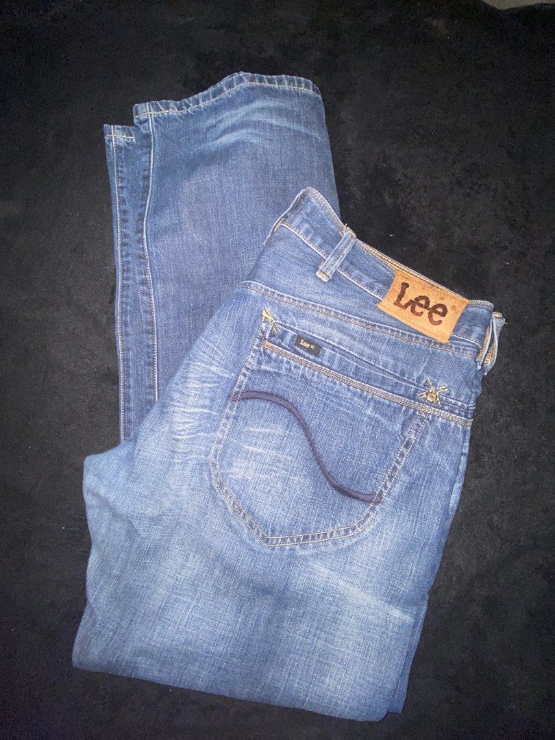 Lee Denim Jeans Blue (Category: Jeans) located in Cagayan de Oro. Submitted by zekoy (Listing ID 1468626016, Image 3). Description: - Brand: Lee - Color/Wash: Blue mid-wash with natural fading patterns - Closure: Button fly with belt loops - Pockets: Classic front, coin, and back pockets - Details: Signature leather back patch - Condition: Excellent, ready to wear.
