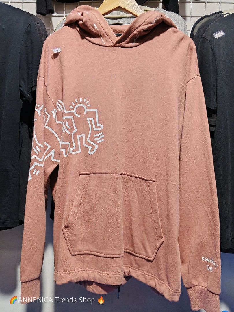 LEE x Keith Haring Collab Hoodie (Category: Coats, Jackets and Outerwear) located in Bulacan. Submitted by annenicathriftthriftlang (Listing ID 1468509363, Image 2). Description: *LEE x Keith Haring Collab Hoodie - Old Rose* *Size L to XL *DIMES:* - Width: 23 inch (pit to pit) - Length: 28 inch - Sleeve: 24 inch - Shoulder: Drop shoulder / Oversized fit - Fit: L to XL (oversized) *CONDITION:* Excellent, no issue, makapal, embroidered sleeve print