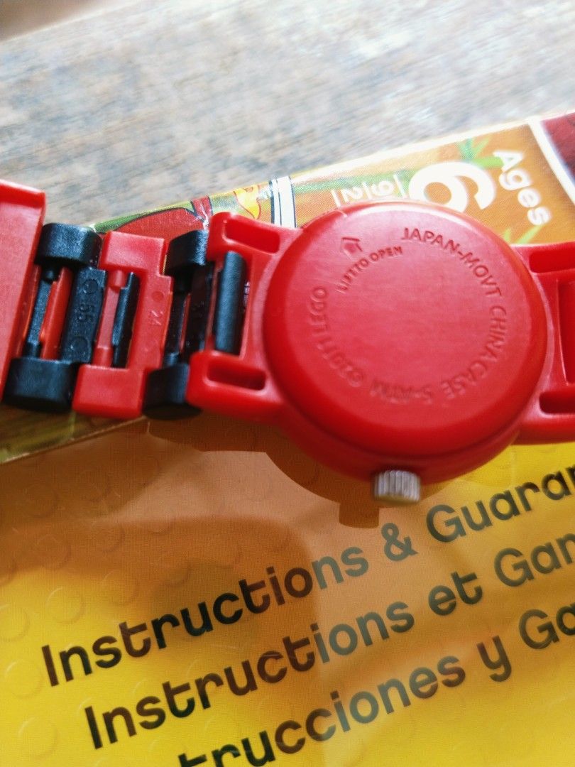 LEGO Ninjago Watch 9004254 (Category: Babies & Kids Fashion) located in Pasig City. Submitted by babylove2003 (Listing ID 1468624919, Image 3). Description: LEGO Ninjago kids watch, model 9004254. Red and black interchangeable link strap. Includes a buildable Kai minifigure integrated right into the band. Analog face with character graphic. Original box and inserts included. Fun accessory for young fans of the series. Perfectly working..