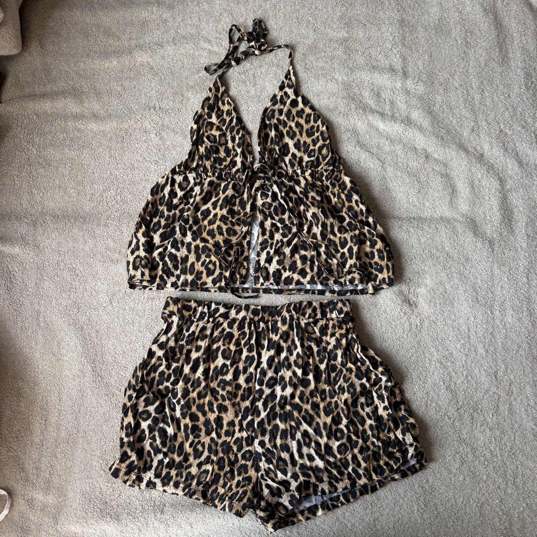 Leopard V neck strappy back and loose short Summer Set (Category: Sets or Coordinates) located in Manila. Submitted by thrifts.el (Listing ID 1468509062, Image 2). Description: Leopard V neck strappy back and loose short Summer Set Excellent Condition Once lang nagamit Size Medium No Issue Orig Price- 533 Sale Price-420 Loc. South Caloocan Courier. J&T/Lalamove.