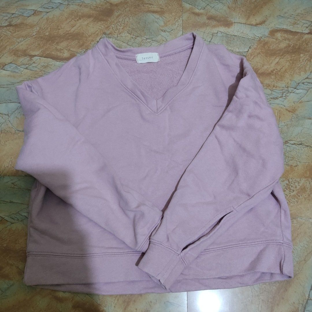 Letter Lavender V-Neck Sweatshirt (Category: Coats, Jackets and Outerwear) located in Valenzuela. Submitted by 0003c4 (Listing ID 1468676531, Image 2). Description: fits xs to small. needs some ironing :) superrr nice fabric!! has a very tiny hole at the back part, but almost not noticeable location: Valenzuela mod: lalamove or jnt.