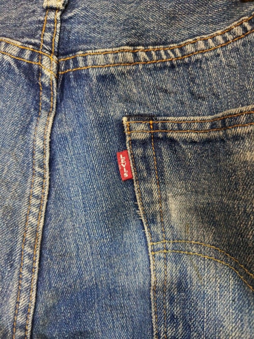 LEVI'S 501 BUTTON FLY BIG E PANTS (Category: Jeans) located in Baguio. Submitted by 074thriftmania (Listing ID 1468601967, Image 3). Description: Classic Levi's 501 jeans in a medium blue wash. Straight leg cut with standard five-pocket styling and button fly. Genuine leather waist patch on the back, red tab on the rear pocket, and inner Levi's Premium label. Tagged size W36 L32. Hand-measured tape notes actual waist 36-38 inches and length 42 in