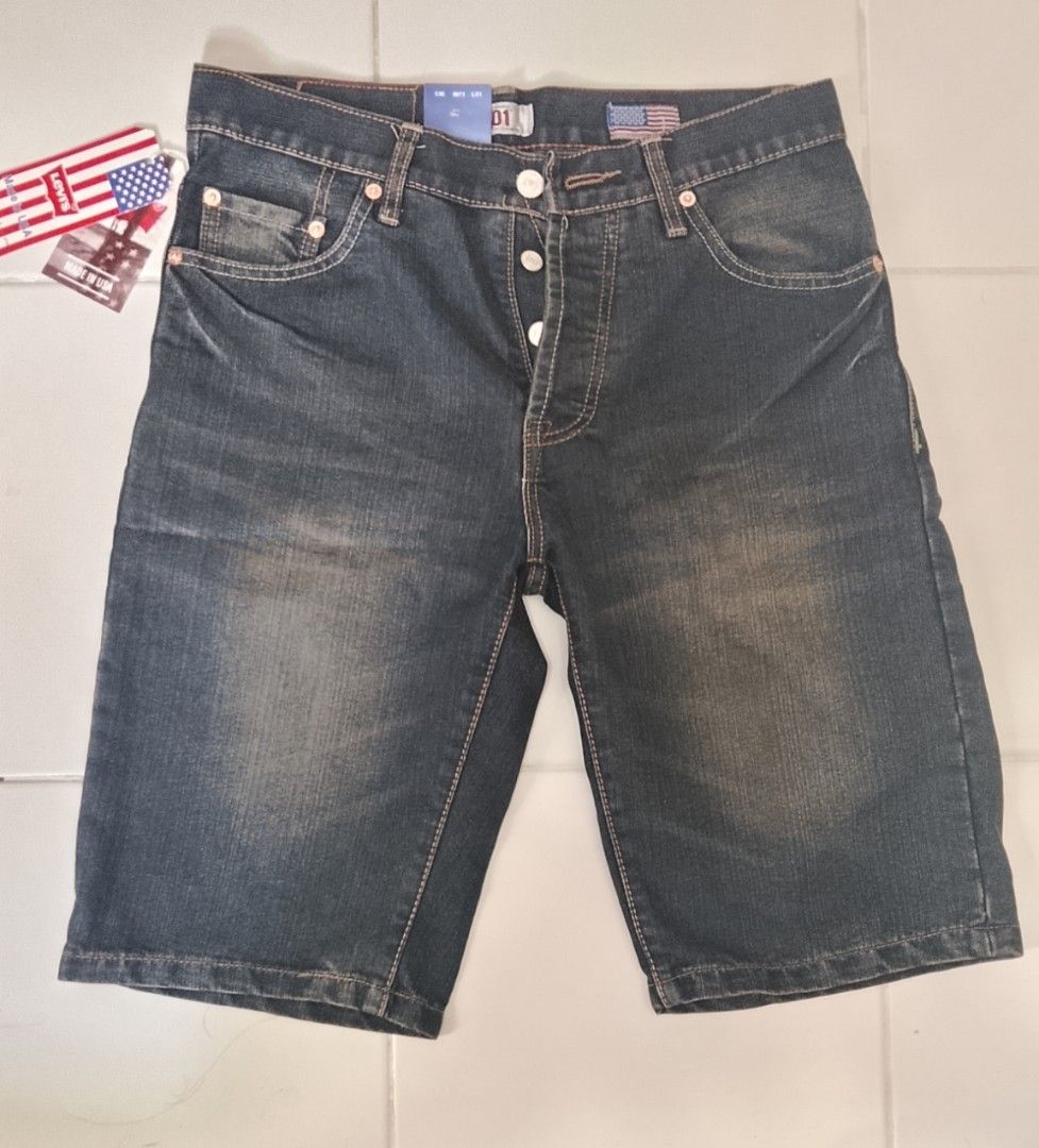 Levi's 501 Denim Shorts Size 30 (Category: Shorts) located in Caloocan City. Submitted by tamonchi (Listing ID 1468589817, Image 1). Description: - Brand: Levi's 501 - Style: Dark wash denim shorts with button fly and five-pocket styling - Condition: Brand new with original tags and paper waist patch attached - Size: Waist 30, Length 32 - Extras: Includes classic American flag pocket insert - Authenticity: 100% unworn and pristine.