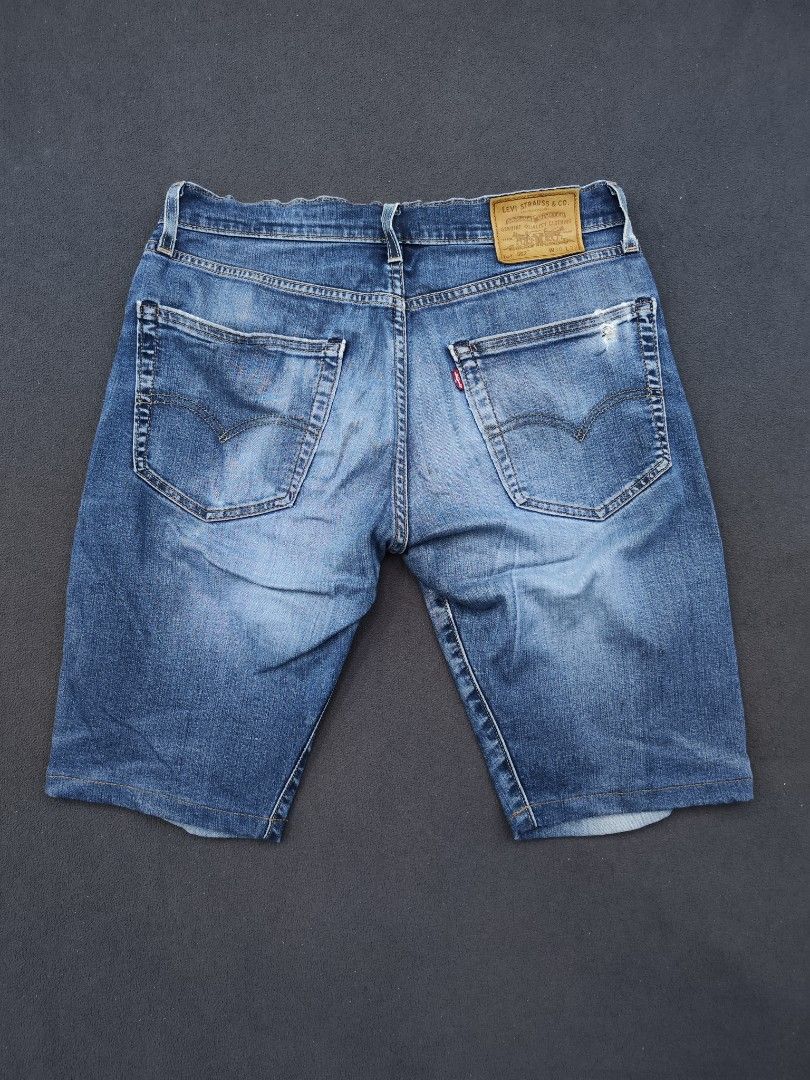 Levis 502 Denim Shorts (Category: Shorts) located in Bulacan. Submitted by emilj23 (Listing ID 1468602428, Image 2). Description: Levis 502 Denim Shorts Size 30x32 on tag L 21 W 32 Leg Hole 8 Condition 910 Color rate 9/10 Issue Slight Loose Waist.