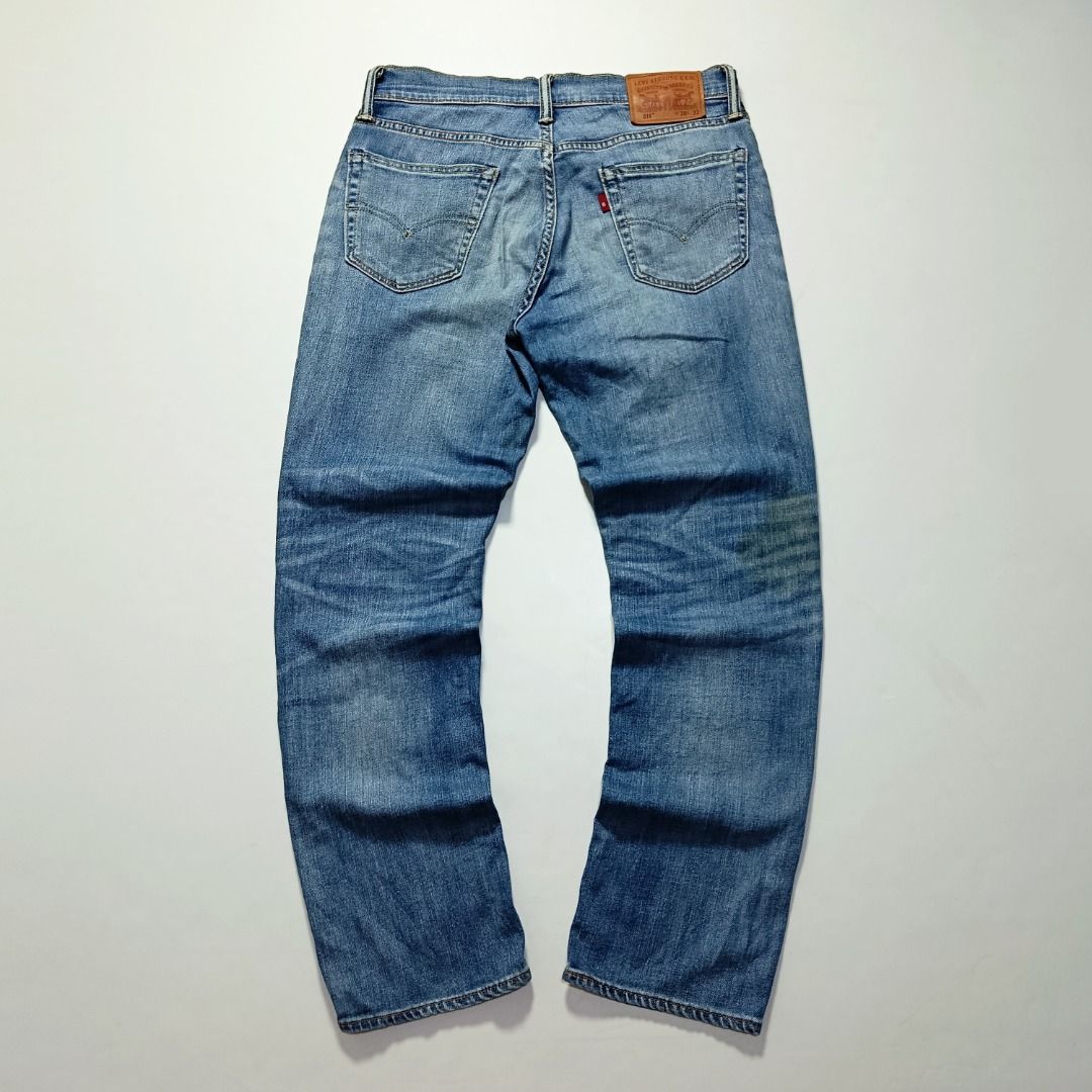 Levi’s 511 Medium Wash Denim Jeans (Category: Jeans) located in Taytay. Submitted by hoodgrail.vtg (Listing ID 1468629636, Image 2). Description: • Excellent condition - Lightly used • Medium blue wash with pronounced whisker fading and classic slim-fit silhouette • Size on tag: W30 L32 — best fits W30 • Measurements: 15 x 38 in • Leg opening: 7 in • Color rate: 9/10 • Issue: Yellow stain (washable).