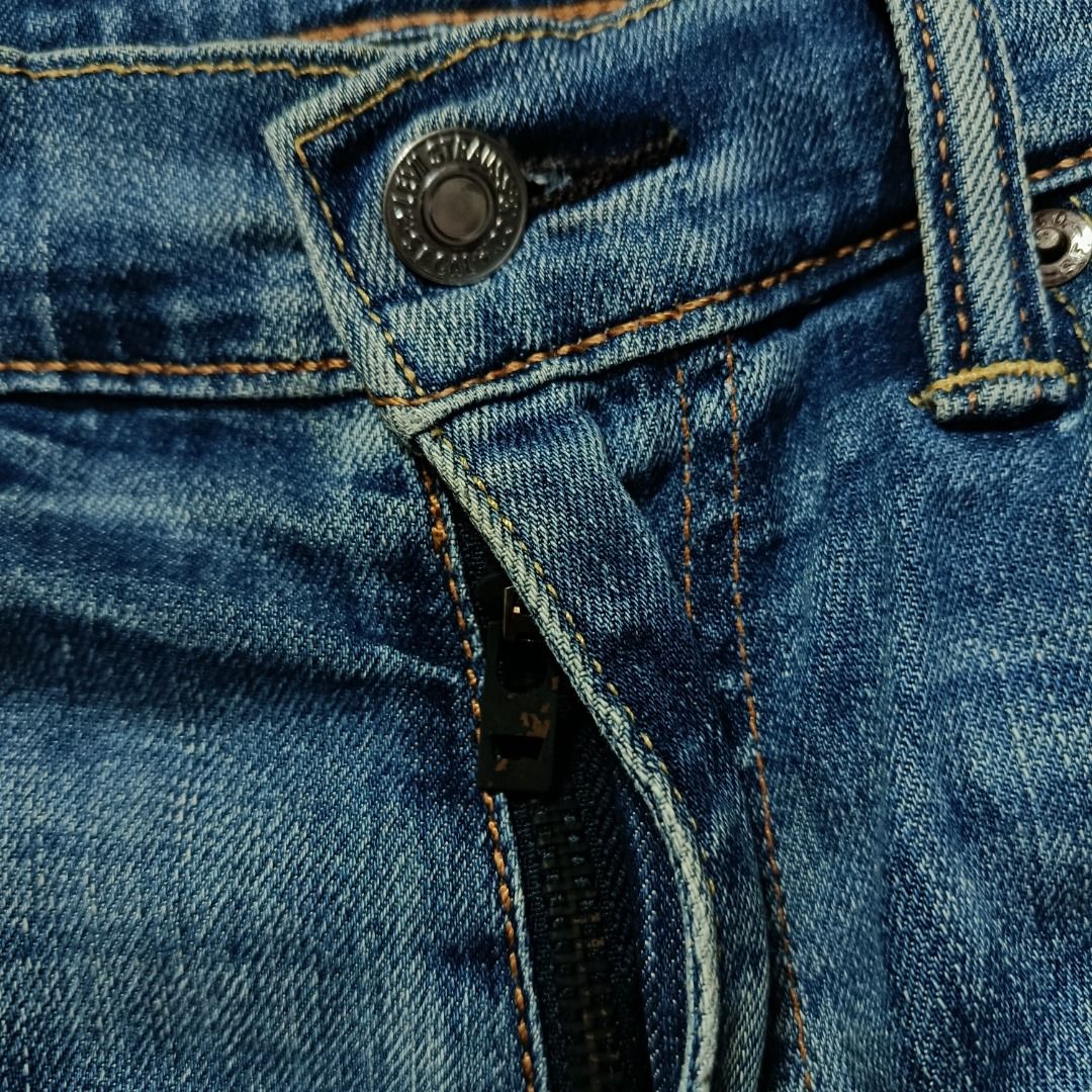 Levi’s 511 Medium Wash Denim Jeans (Category: Jeans) located in Taytay. Submitted by hoodgrail.vtg (Listing ID 1468629636, Image 3). Description: • Excellent condition - Lightly used • Medium blue wash with pronounced whisker fading and classic slim-fit silhouette • Size on tag: W30 L32 — best fits W30 • Measurements: 15 x 38 in • Leg opening: 7 in • Color rate: 9/10 • Issue: Yellow stain (washable).