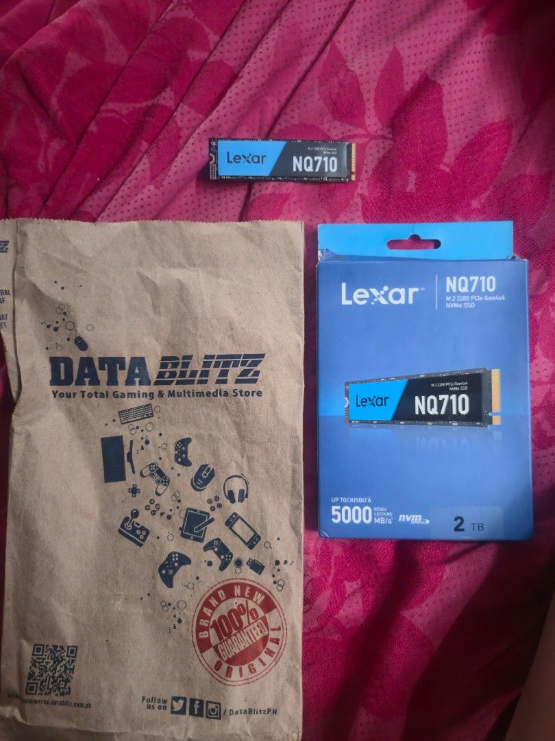 Lexar NQ710 2TB M.2 NVMe SSD (Category: Hard Disks & Thumbdrives) located in Mandaluyong City. Submitted by BudzTheGreat (Listing ID 1468524850, Image 3). Description: - Item: Lexar NQ710 2TB M.2 2280 NVMe SSD - Condition: used, with original blue packaging box - Source: Bought from DataBlitz on August 6, 2025 - Inclusions: Original store paper bag and receipt included for warranty - Performance: Fast storage upgrade for laptops and desktop PCs R