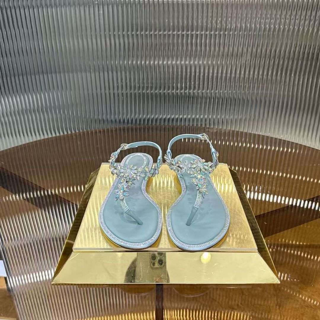 Light Blue Crystal Embellished Flat Sandals (Category: Flats & Sandals) located in Pateros City. Submitted by purebird_714be0 (Listing ID 1468577214, Image 1). Description: - Color: Light Blue - Design: T-strap with sparkling crystal floral embellishments - Closure: Adjustable ankle strap with buckle - Sole: Soft leather-look for comfortable walking - Style: Eye-catching statement piece perfect for summer outings, parties, and daily wear - Condit