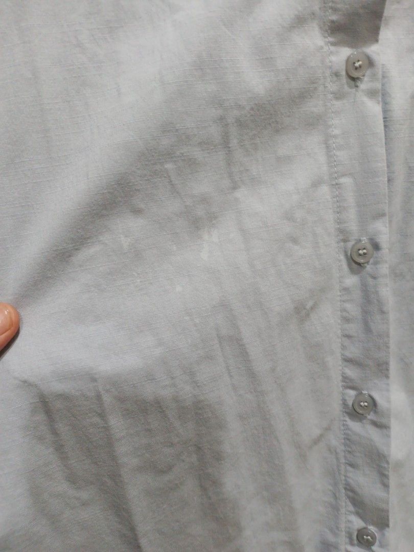 Light blue long-sleeve button-up shirt (Category: Longsleeves) located in Manila. Submitted by ggarage.sale (Listing ID 1468688799, Image 3). Description: - Color: Light blue - Style: Button-up with classic collar and standard button cuffs - Fit: Relaxed fit, long sleeves - Condition: Good, just needs a quick iron due to storage - Versatile piece for work or weekend wear.