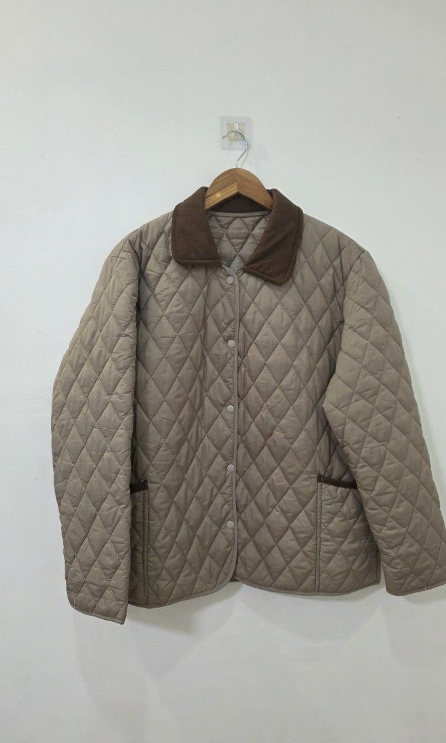 Light Brown Quilted Jacket with Brown Corduroy Collar (Category: Coats, Jackets and Outerwear) located in Antipolo. Submitted by chimmychoo (Listing ID 1468655388, Image 1). Description: THRIFTED 🌼 SIZE: L-XL shoulders 19" width 22" length 27" Flaws: Stain.
