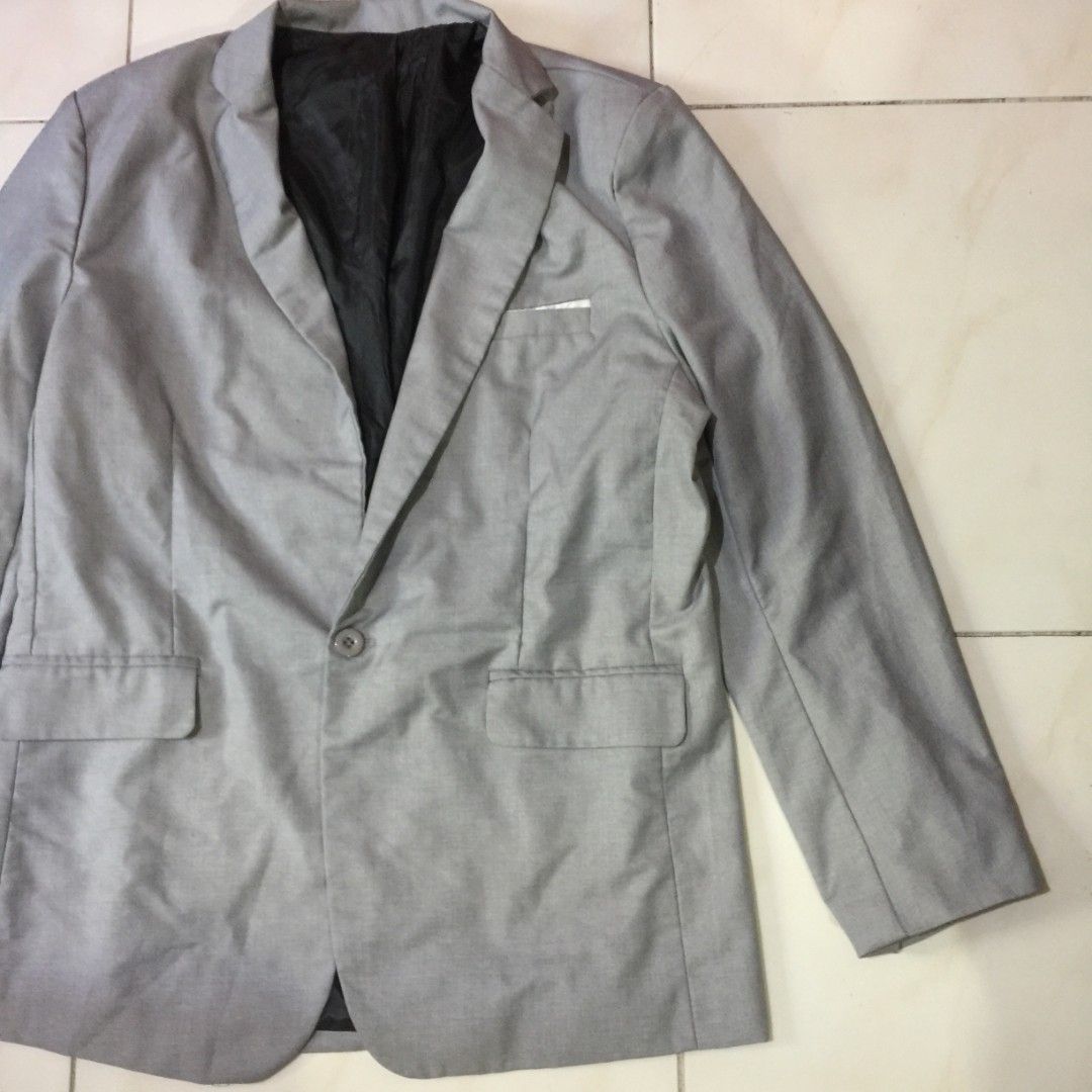 Light Gray Single-button Suit Jacket Blazer / Corporate Blazer (Category: Coats, Jackets and Outerwear) located in Pasig City. Submitted by butfirst.declutter (Listing ID 1468577324, Image 2). Description: - Like new. No issue - All front pockets are design only - Fits L-XL men (2XL on tag) - Single front button closure - Complete buttons - Color may vary due to lighting - See photos for measurements - Manage your expectations since this is a pre