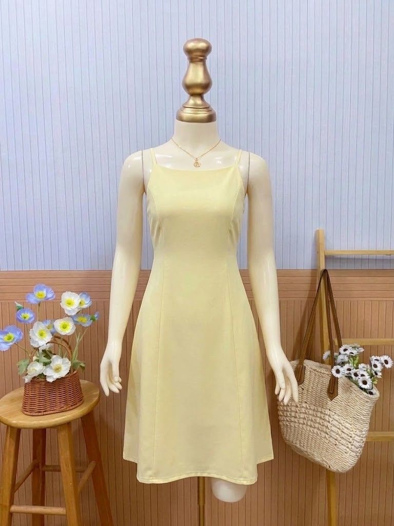 Light Yellow Midi Dress (Category: Dresses) located in Roxas City. Submitted by blairnstyle (Listing ID 1468619161, Image 1). Description: ​Color: light yellow ​Straps: Thin spaghetti straps ​Silhouette & Length: Fitted bodice with vertical panel seams and a flared, midi-length skirt ​Style: Simple, elegant, and summery—ideal for casual days, sunny outings, or resort wear.