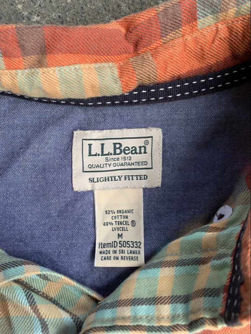 l.l.bean Plaid Long Sleeve Button-Down Shirt Medium (Category: Longsleeves) located in Naga. Submitted by than09070539101 (Listing ID 1468520054, Image 3). Description: - Brand: L.L.Bean - Style: Plaid button-down shirt with contrasting inner collar lining - Colorway: Orange and teal tones - Size: Medium (Slightly fitted cut) - Material: 52% Organic cotton, 48% Tencel lyocell - Features: Long sleeves, dual front chest pockets, branded brown butto