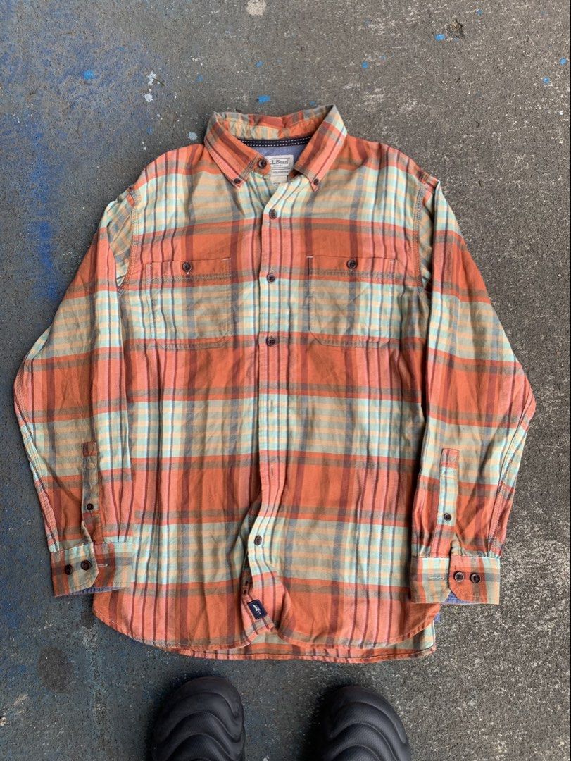 l.l.bean Plaid Long Sleeve Button-Down Shirt Medium (Category: Longsleeves) located in Naga. Submitted by than09070539101 (Listing ID 1468520054, Image 1). Description: - Brand: L.L.Bean - Style: Plaid button-down shirt with contrasting inner collar lining - Colorway: Orange and teal tones - Size: Medium (Slightly fitted cut) - Material: 52% Organic cotton, 48% Tencel lyocell - Features: Long sleeves, dual front chest pockets, branded brown butto