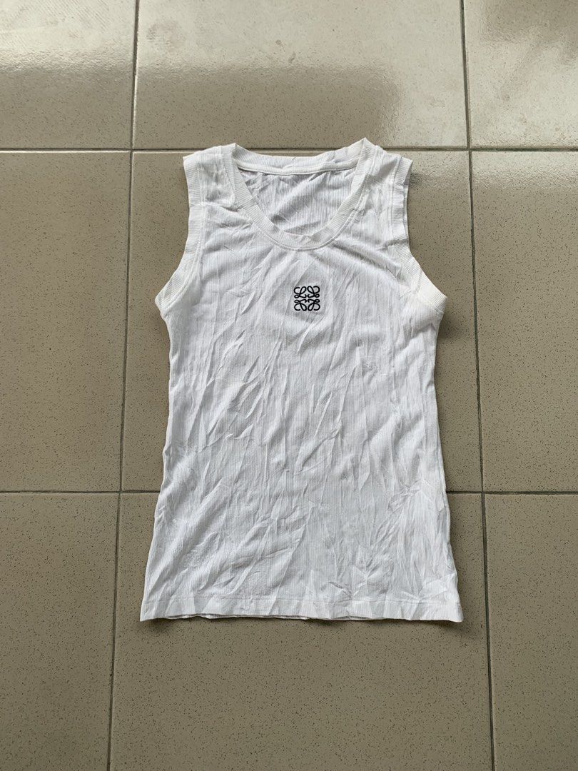 Loewe tank top (Category: Blouses) located in Cotabato. Submitted by clarence0918 (Listing ID 1468656595, Image 1). Description: Good as new no issue 10/10 color rate 12x21 washed.