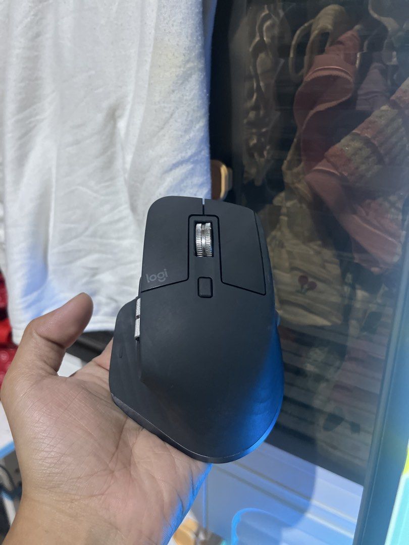 Logitech MX Master 3s Wireless Mouse with USB Receiver (Category: Mouse & Mousepads) located in Quezon City. Submitted by alyxxz (Listing ID 1468541817, Image 2). Description: issue gasgas lang sa rubber - Model: Logitech MX Master 3 Wireless Mouse - Color: Dark Grey - Includes: USB unifying receiver and charging cable - Features: Ergonomic thumb rest, side scroll wheel, and gesture button - Condition: Tested and works great, clean with minor sig