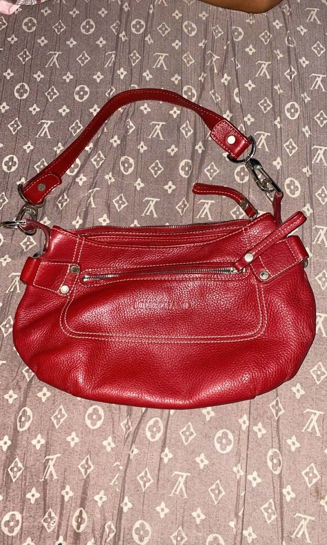 Longchamp 2000s Red Pebbled Leather Shoulder Bag (Category: Shoulder Bags) located in Laur. Submitted by itzeco999 (Listing ID 1468586041, Image 1). Description: 699 ONLY PLUS SHIP ISSUE NASA PIC NUEVA ECIJA LOC #salemate.