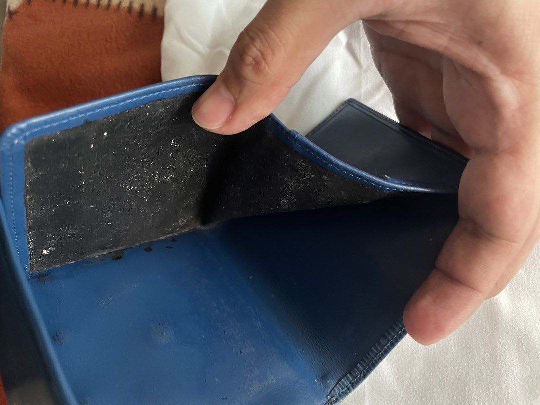 Louis Vuitton Epi Leather Blue Wallet (Category: Luxury Bags & Wallets) located in Mandaluyong City. Submitted by jetzkypreloveditems (Listing ID 1468619030, Image 3). Description: - 100% Authentic Louis Vuitton Epi leather wallet in a classic blue shade - Features the iconic textured wavy grain pattern and subtle embossed LV initials - Secure snap-button closure opens to practical bill compartments and a coin pocket - Pre-loved condition with he