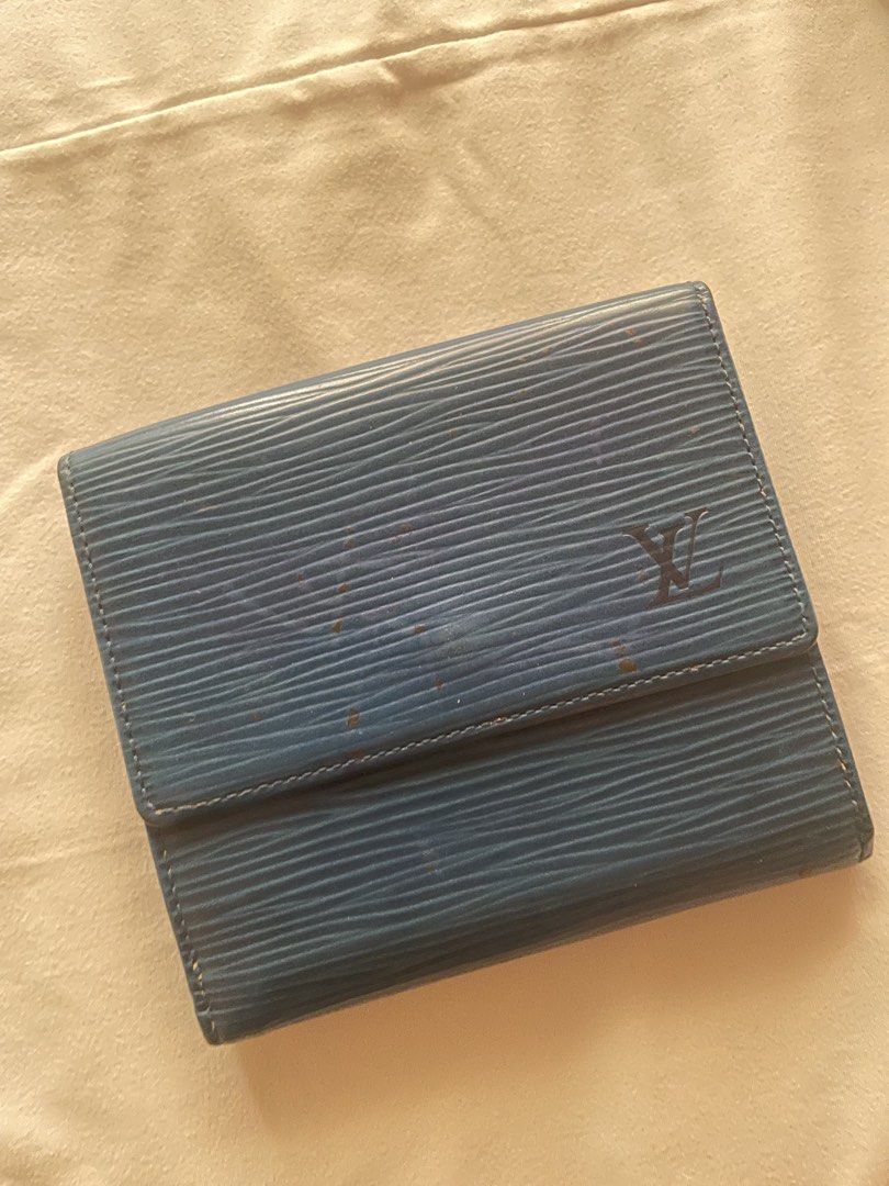 Louis Vuitton Epi Leather Blue Wallet (Category: Luxury Bags & Wallets) located in Mandaluyong City. Submitted by jetzkypreloveditems (Listing ID 1468619030, Image 1). Description: - 100% Authentic Louis Vuitton Epi leather wallet in a classic blue shade - Features the iconic textured wavy grain pattern and subtle embossed LV initials - Secure snap-button closure opens to practical bill compartments and a coin pocket - Pre-loved condition with he