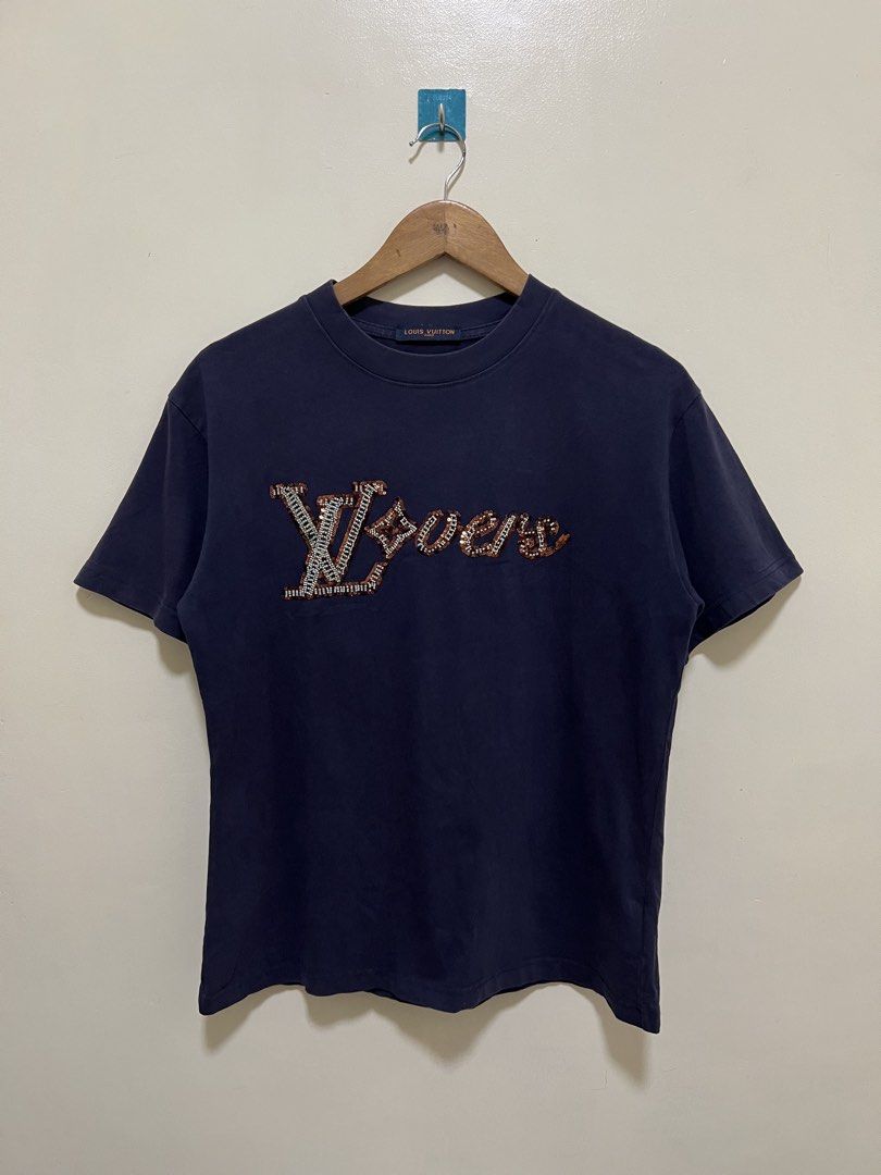 Louis Vuitton Lovers Design Navy Blue Shirt (Category: Luxury Apparel) located in Manila. Submitted by thriftpoint99 (Listing ID 1468645290, Image 1). Description: 20x25 No issue Excellent condition.