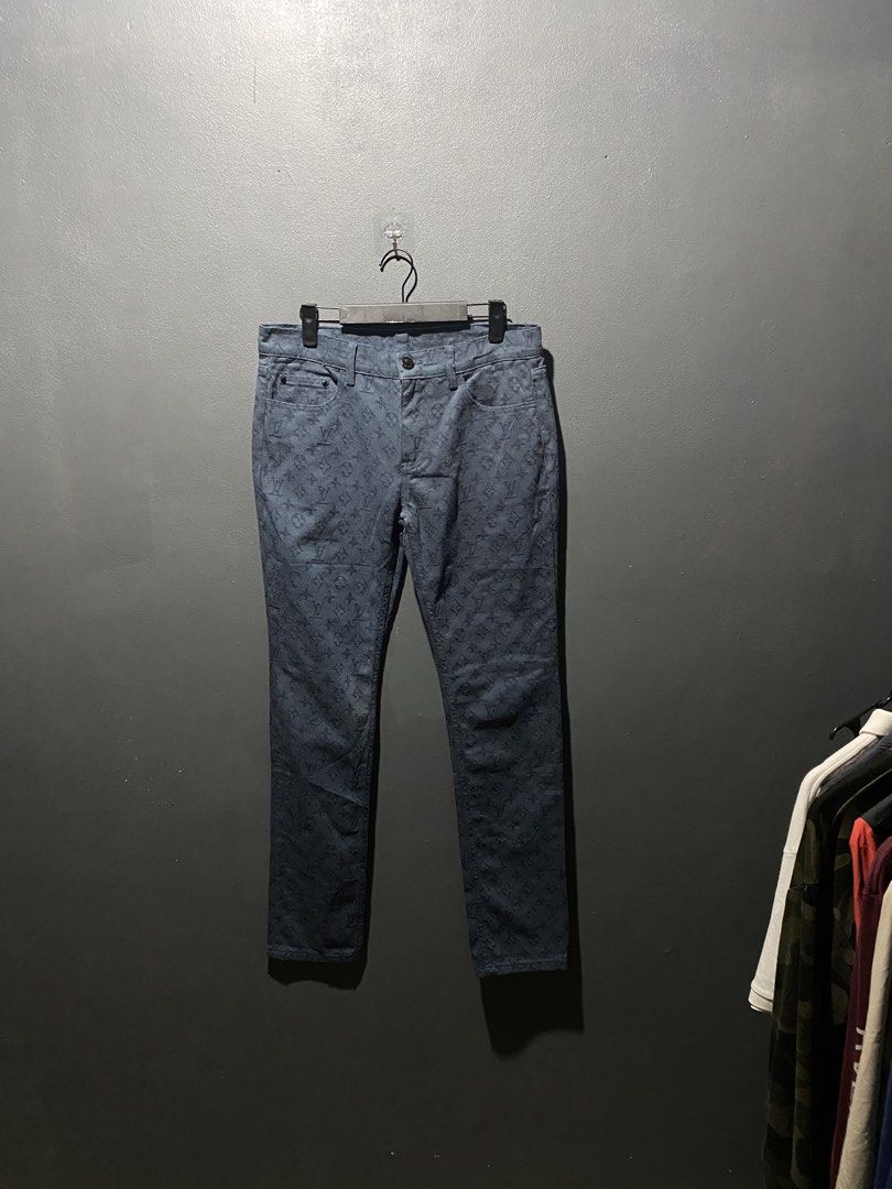Louis Vuitton Monogram Denim Pants Dark Blue (Category: Jeans) located in Lucena. Submitted by handpickthrift (Listing ID 1468618370, Image 1). Description: - Color: Dark blue with all-over monogram pattern - Fit: Straight leg cut Size 30-31 - Design: Standard five-pocket style - Hardware: Branded button closure and engraved zipper pull - Material: High-quality denim with subtle woven detailing.